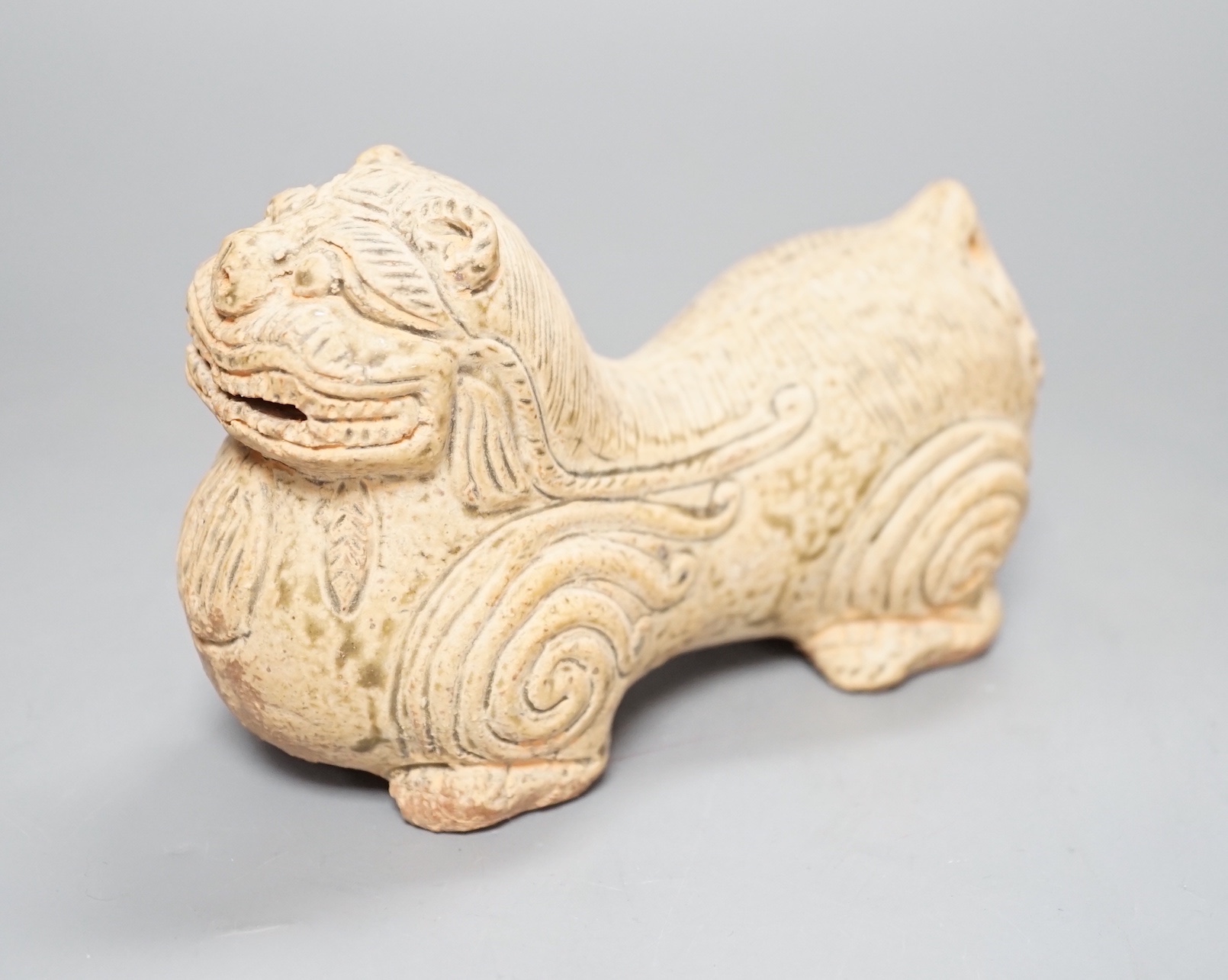 A Chinese green glazed 'lion-dog' - 15.5cm